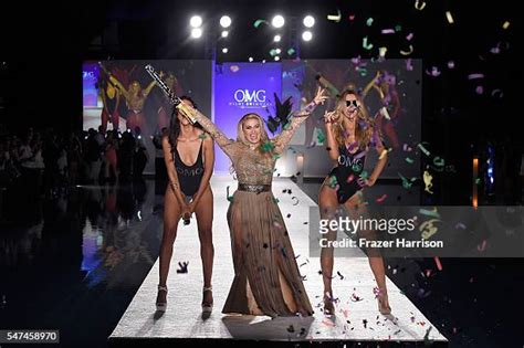 andrea gaviria|Designer Andrea Gaviria poses on the runway at the OMG .